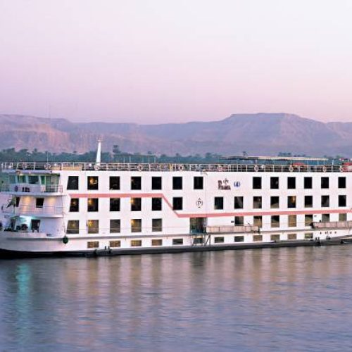 Cruiseboat-sailing-down-the-Nile-at-sunset-686301548331555_crop_610_410